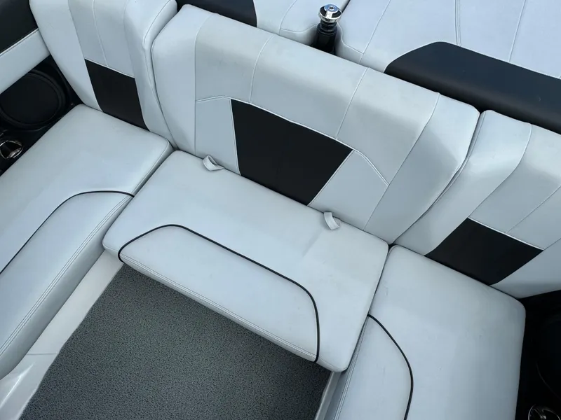 Slide: The Image of 2022 Malibu Wakesetter 20 VTX interior seating, featuring sleek white and black upholstery. - 36