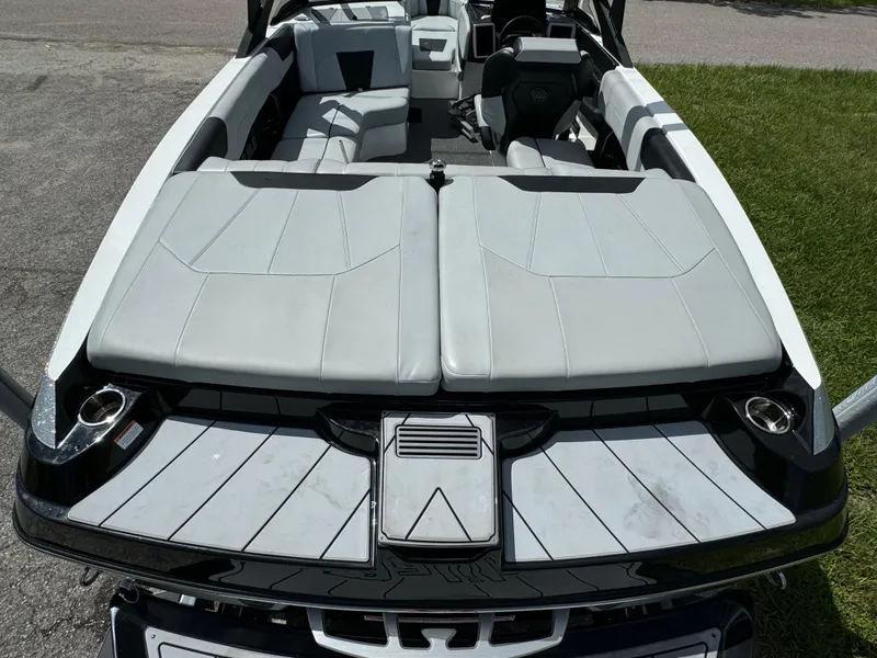 Slide: The Image of 2022 Malibu Wakesetter 20 VTX interior with sleek gray seating and modern design. - 46