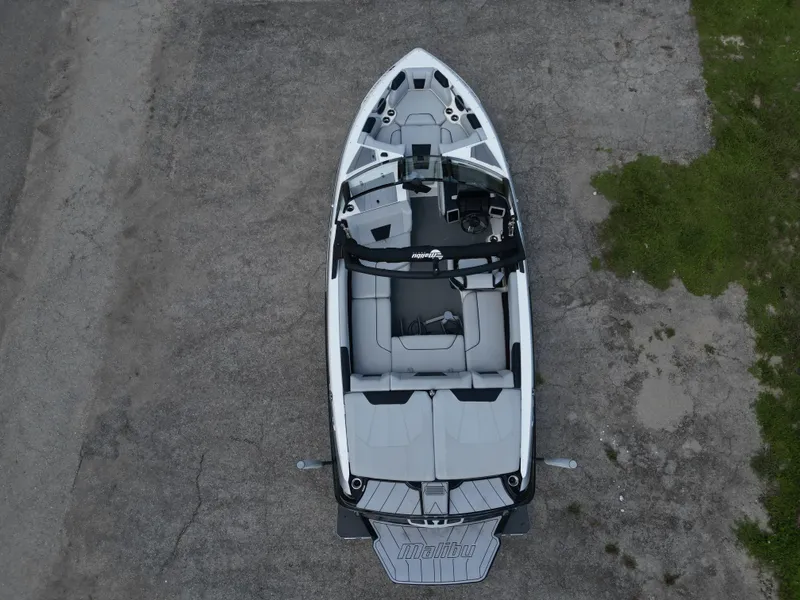 Slide: The Image of 2022 Malibu Wakesetter 20 VTX boat, aerial view, parked on concrete surface. - 5