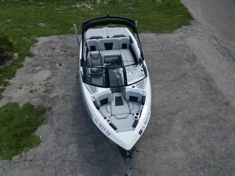 Slide: The Image of 2022 Malibu Wakesetter 20 VTX boat, aerial view, parked on pavement. - 6