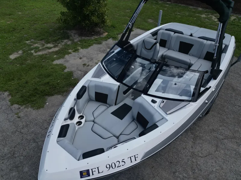 Slide: The Image of 2022 Malibu Wakesetter 20 VTX boat with sleek design and comfortable seating. - 8