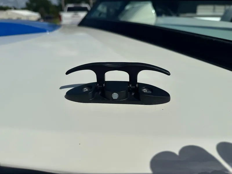 Slide: The Image of 1977 Correct Craft Ski Nautique boat cleat on deck, close-up view. - 11