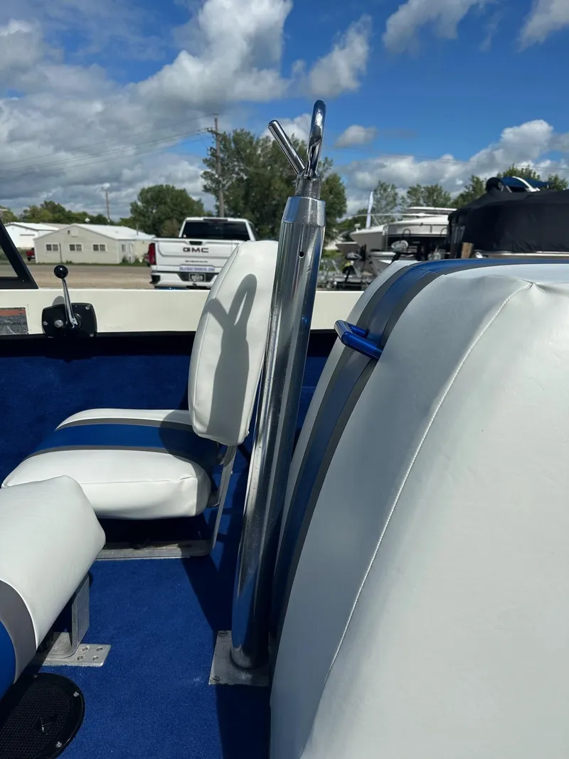Slide: The Image of 1977 Correct Craft Ski Nautique interior with white seats and blue accents. - 13