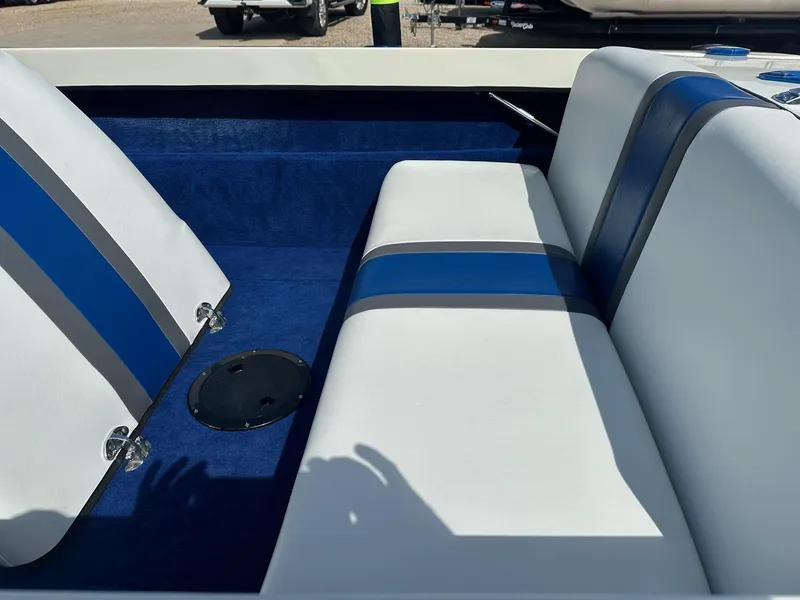 Slide: The Image of 1977 Correct Craft Ski Nautique interior with blue and white seating. - 14