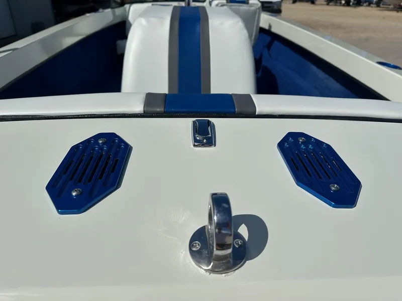 Slide: The Image of 1977 Correct Craft Ski Nautique boat interior with blue and white upholstery details. - 15