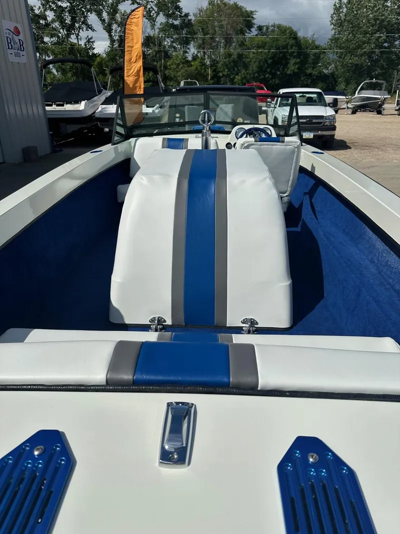 Slide: The Image of 1977 Correct Craft Ski Nautique boat interior with blue and white upholstery. - 16