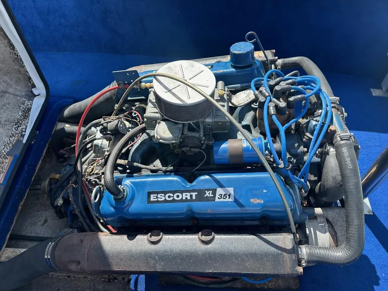 Slide: The Image of 1977 Correct Craft Ski Nautique engine, Escort XL 351, blue components, detailed view. - 18