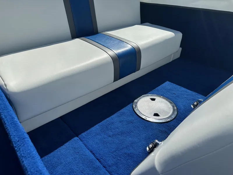 Slide: The Image of 1977 Correct Craft Ski Nautique interior with blue and white upholstery. - 21