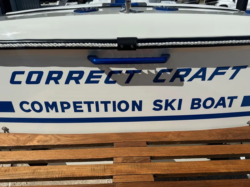 Slide: The Image of 1977 Correct Craft Ski Nautique competition ski boat with wooden bench. - 22