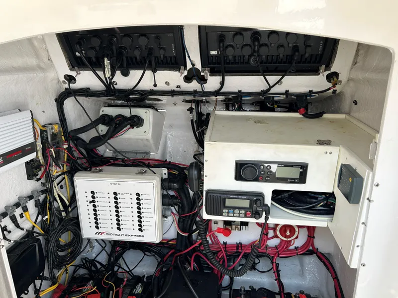 Slide: The Image of Electrical system of a 2008 Midnight Express 37 boat, showcasing wiring and control panels. - 16