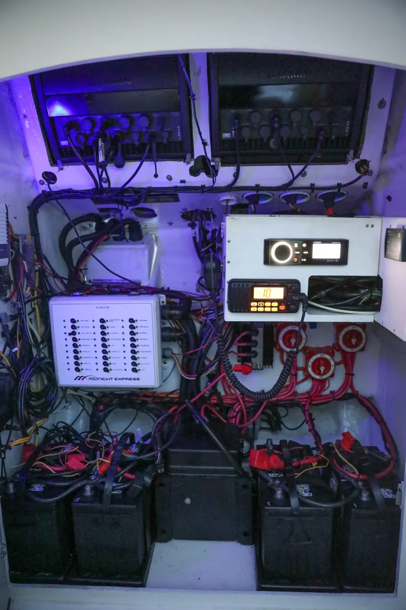 Slide: The Image of Electrical system of a 2008 Midnight Express 37 boat, featuring batteries and wiring. - 33