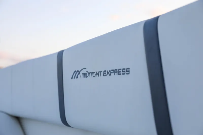 Slide: The Image of Close-up of 2008 Midnight Express 37 boat upholstery with logo. - 9