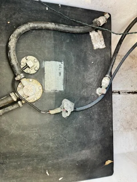 Slide: The Image of Fuel tank and hoses of 2016 Sportsman Island Reef 19 Center Console boat. - 15