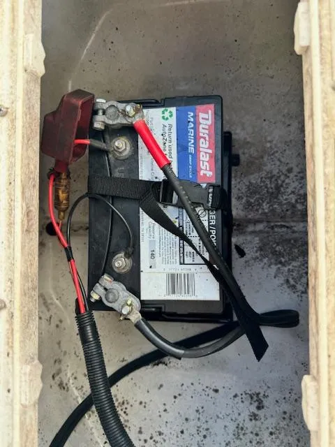 Slide: The Image of Marine battery in a 2016 Sportsman Island Reef 19 Center Console boat. - 18