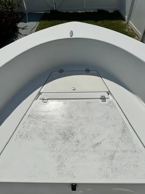 Slide: The Image of 2016 Sportsman Island Reef 19 Center Console boat deck, white and spacious. - 20