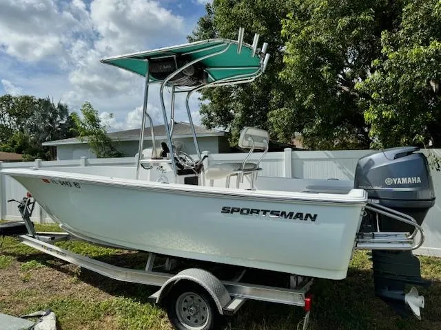 Slide: The Image of 2016 Sportsman Island Reef 19 Center Console boat on trailer with Yamaha engine. - 26