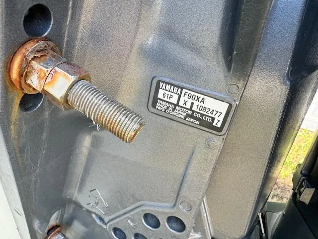 Slide: The Image of Close-up of Yamaha F90XA engine part on 2016 Sportsman Island Reef 19 Center Console. - 6
