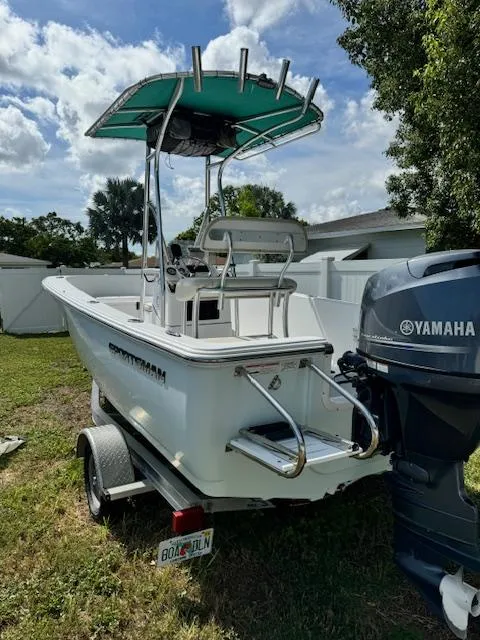 Slide: The Image of 2016 Sportsman Island Reef 19 Center Console boat with Yamaha engine on trailer. - 7