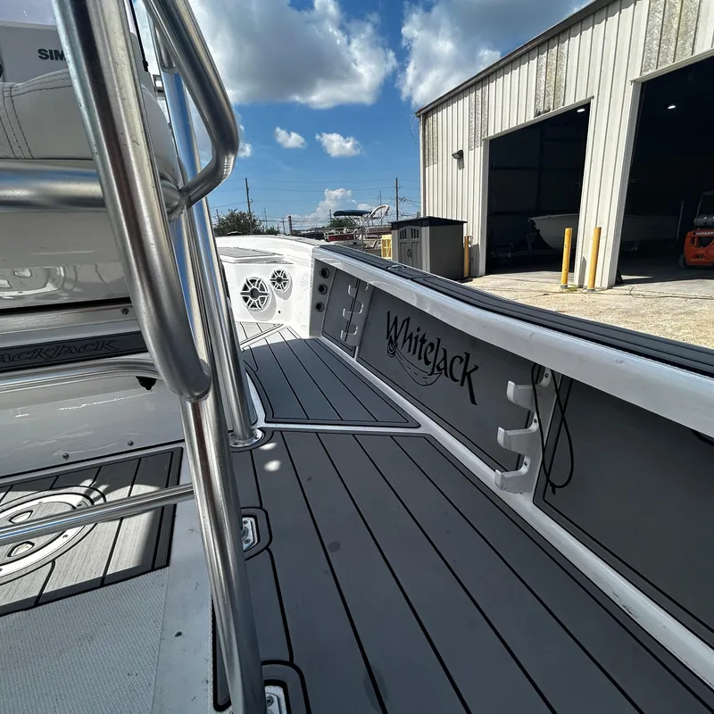 Slide: The Image of 2021 BlackJack 256 Bay boat interior with sleek design and modern features. - 13