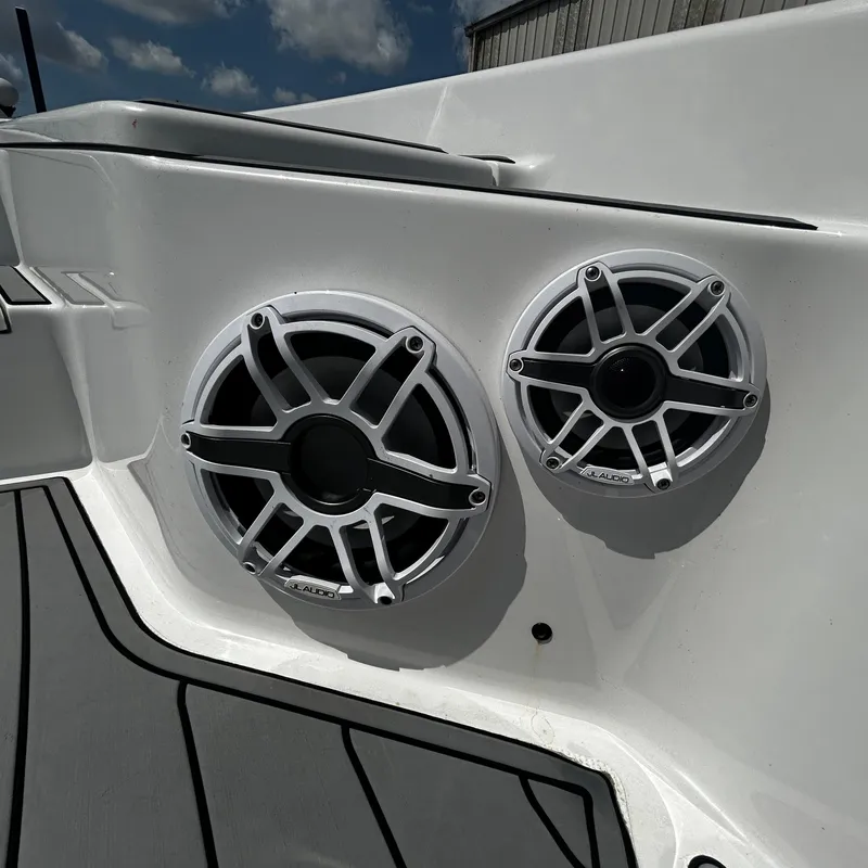 Slide: The Image of Close-up of marine speakers on a 2021 BlackJack 256 Bay boat. - 20