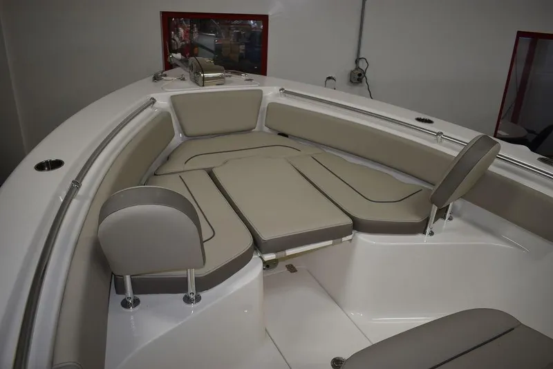 Slide: The Image of 2024 Key West 239 FS boat interior with cushioned seating and modern design. - 20