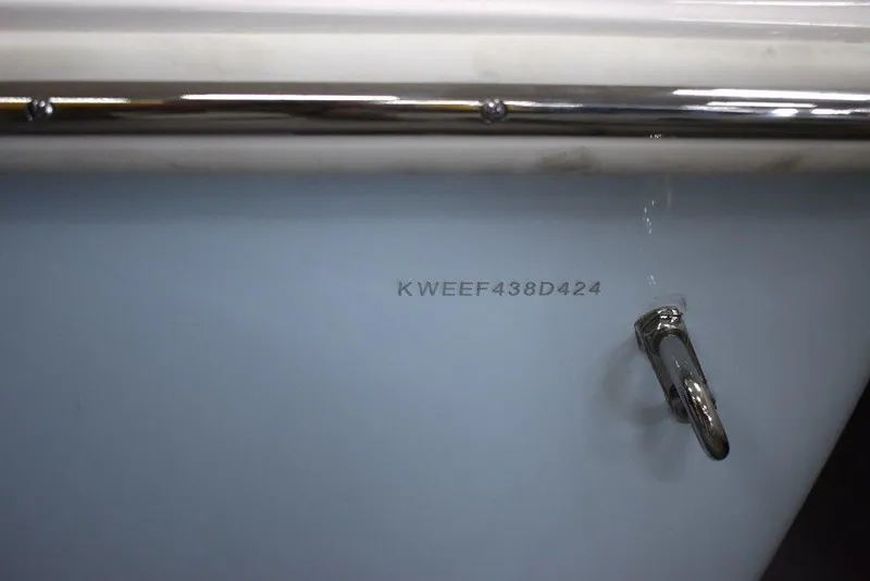 Slide: The Image of 2024 Key West 239 FS boat hull with serial number and metal cleat. - 39
