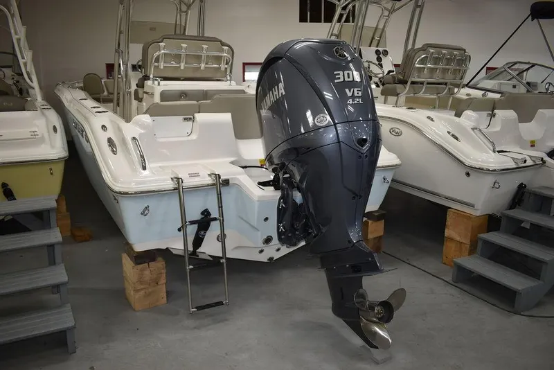 Slide: The Image of 2024 Key West 239 FS boat with Yamaha 300 V6 engine in showroom. - 5