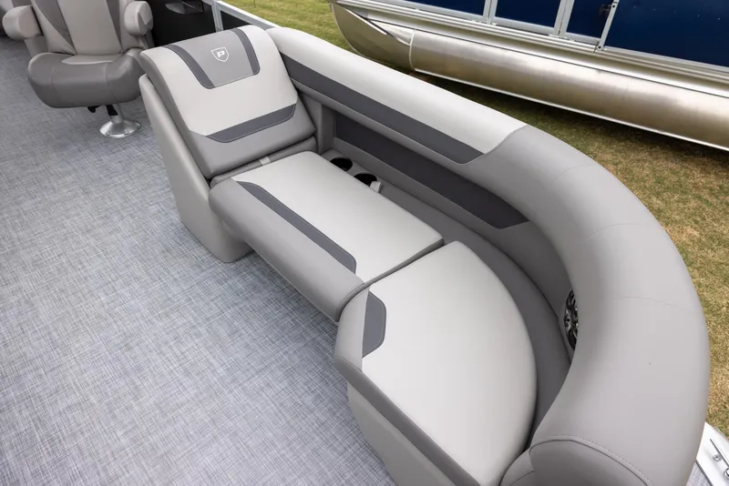 Slide: The Image of Premier 220 Sunscape RF 2025 boat interior with gray seating and modern design. - 5