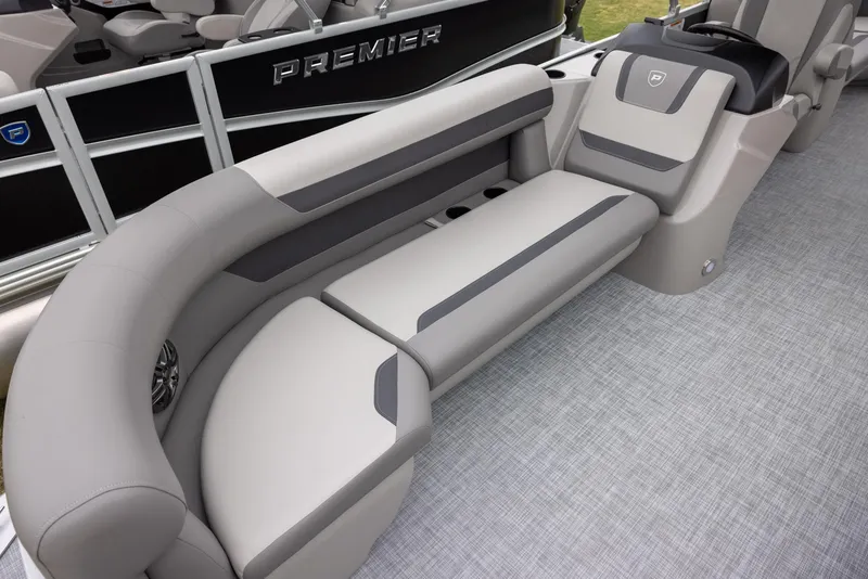 Slide: The Image of 2025 Premier 220 Sunscape RF boat interior with gray seating and modern design. - 6