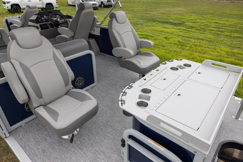 Slide: The Image of 2025 Premier 230 SunSation Angler boat interior with comfortable seating and fishing station. - 15