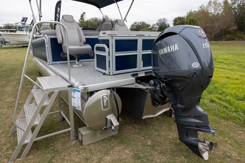 Slide: The Image of 2025 Premier 230 SunSation Angler pontoon boat with Yamaha 150 engine, rear view. - 2