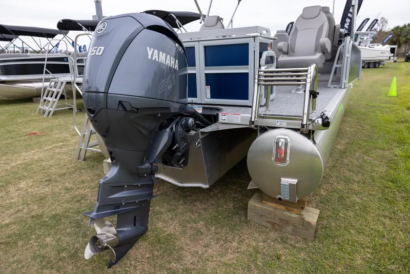 Slide: The Image of 2025 Premier 230 SunSation Angler boat with Yamaha motor displayed on grass. - 3