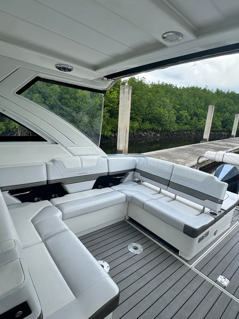 Slide: The Image of 2021 Formula 380 Super Sport Crossover OB interior with sleek seating and modern design. - 10