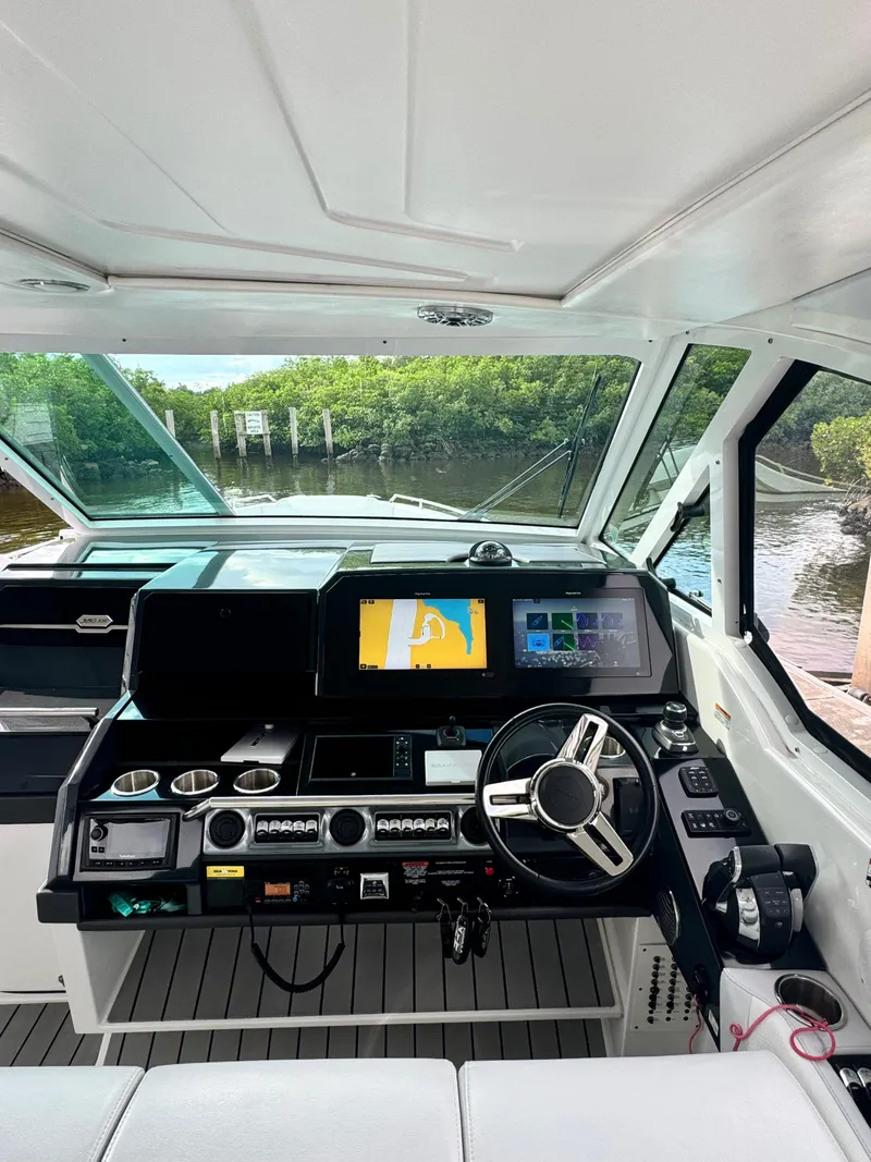 Slide: The Image of 2021 Formula 380 Super Sport Crossover OB helm with advanced navigation system. - 14