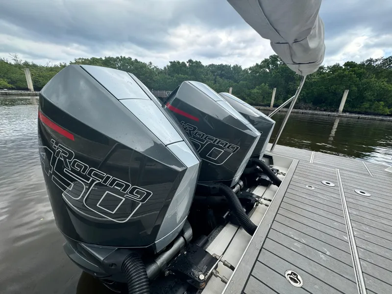 Slide: The Image of Triple outboard engines on a 2021 Formula 380 Super Sport Crossover OB boat. - 24