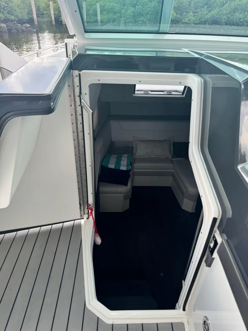 Slide: The Image of Interior cabin view of 2021 Formula 380 Super Sport Crossover OB boat. - 32