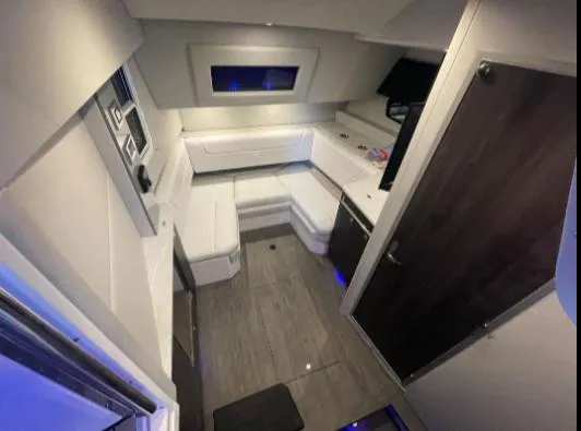 Slide: The Image of Interior of 2021 Formula 380 Super Sport Crossover OB, featuring modern seating and sleek design. - 37