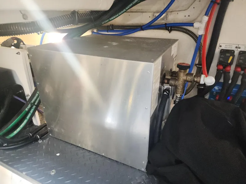 Slide: The Image of Engine compartment of 2021 Formula 380 Super Sport Crossover OB with wiring and components. - 44