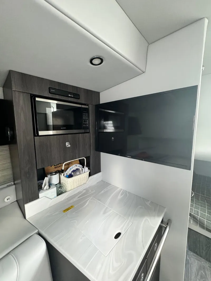 Slide: The Image of 2021 Formula 380 Super Sport Crossover OB interior with microwave and TV. - 45