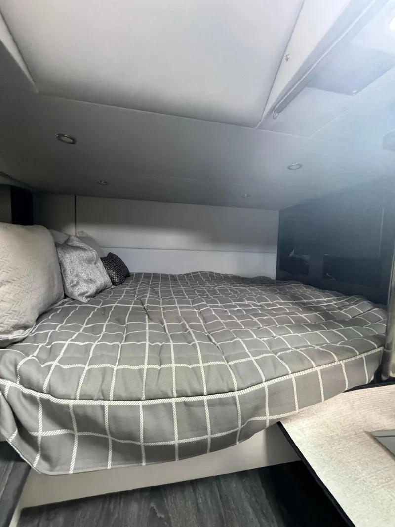 Slide: The Image of Cozy cabin interior of 2021 Formula 380 Super Sport Crossover OB with comfortable bedding. - 46