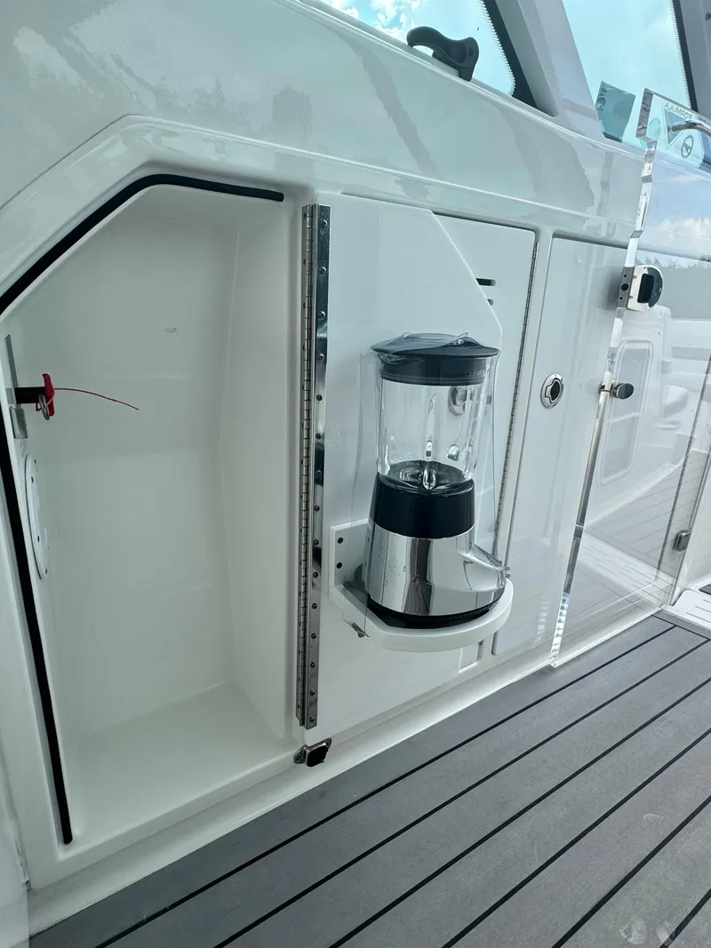 Slide: The Image of 2021 Formula 380 Super Sport Crossover OB interior with built-in blender on deck. - 49