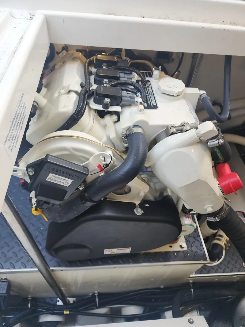 Slide: The Image of Engine compartment of 2021 Formula 380 Super Sport Crossover OB boat. - 61