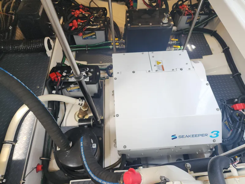 Slide: The Image of Seakeeper 3 stabilizer in 2021 Formula 380 Super Sport Crossover OB engine room. - 63