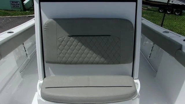 Slide: The Image of 2025 Sportsman Open 212 boat seat with quilted design. - 12