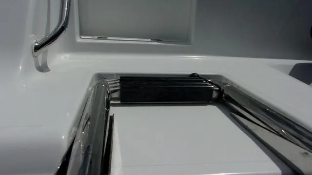 Slide: The Image of 2025 Sportsman Open 212 boat ladder detail, stainless steel construction. - 5