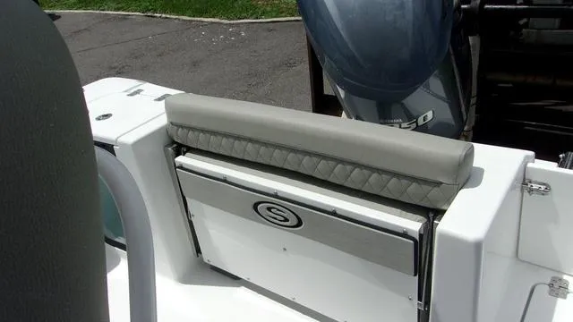 Slide: The Image of 2025 Sportsman Open 212 boat seat and storage compartment. - 7