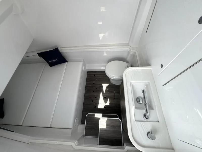 Slide: The Image of Modern bathroom interior in 2025 Phenom 37, featuring sleek design and compact layout. - 20