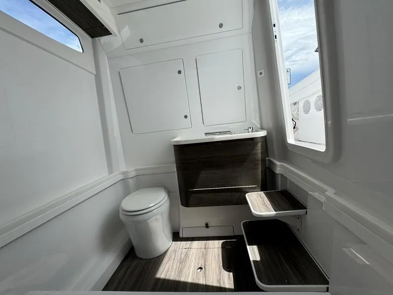 Slide: The Image of Modern bathroom interior in Phenom 37, 2025 model, featuring sleek design and natural lighting. - 21