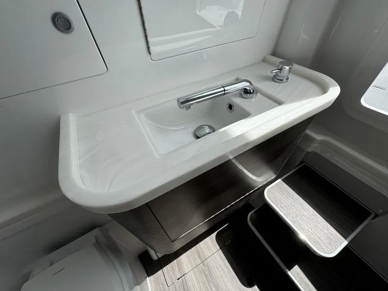 Slide: The Image of Modern bathroom sink in 2025 Phenom 37, featuring sleek design and chrome fixtures. - 25
