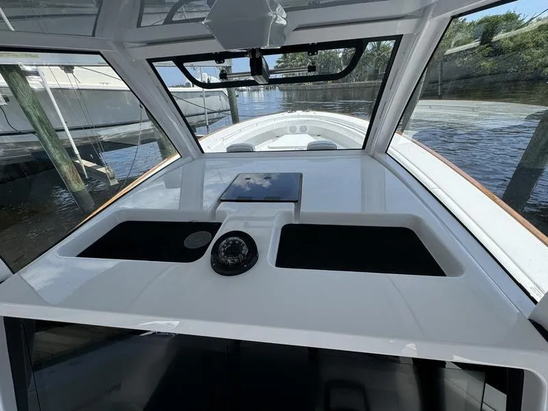 Slide: The Image of Phenom 37 boat cockpit, 2025 model, featuring sleek design and modern navigation equipment. - 39